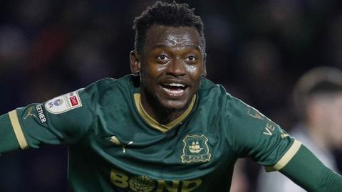 Mustapha Bundu celebrates scoring his first goal for Plymouth Argyle