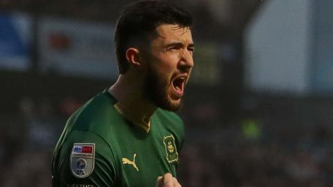 Finn Azaz celebrates scoring for Plymouth Argyle