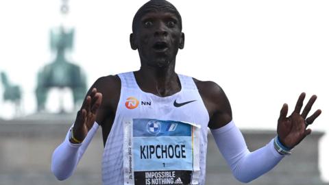 Eliud Kipchoge reacts to his world record marathon time in Berlin