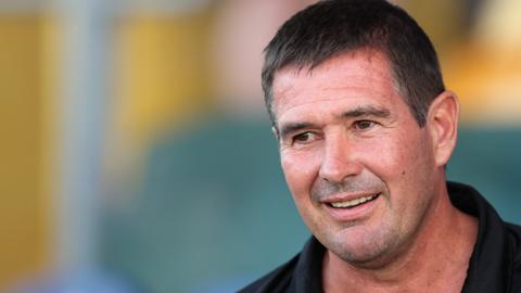 Mansfield Town boss Nigel Clough in the dugout