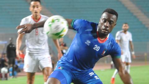 Buyla Jannick of Equatorial Guinea in action against Tunisia