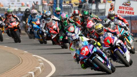 Motorbikes and their riders in action at the North West 200