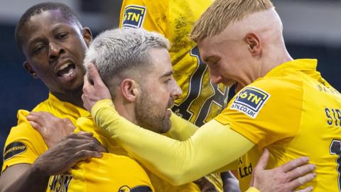 Livingston celebrate Scott Robinson's opener