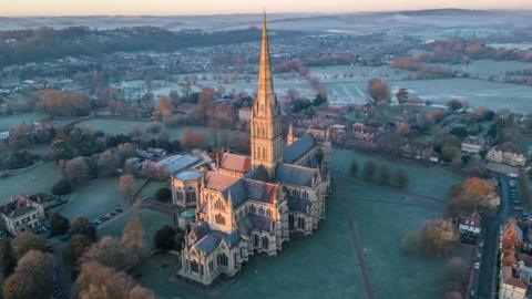 A drone photo of the cathedral from up high on a cold morning