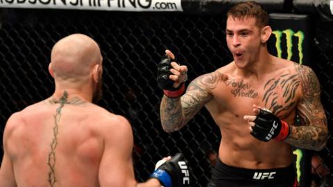 Dustin Poirier during his fight with Conor McGregor at UFC 257