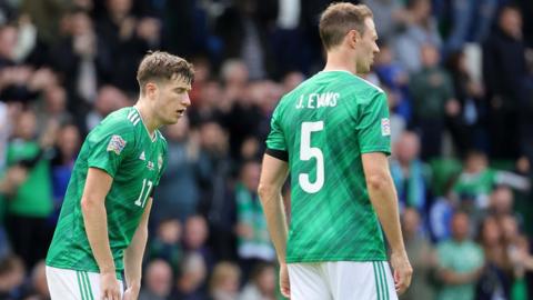 Paddy McNair and Jonny Evans