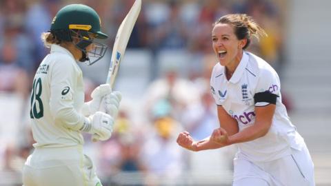 Kate Cross celebrates the wicket of Phoebe Litchfield