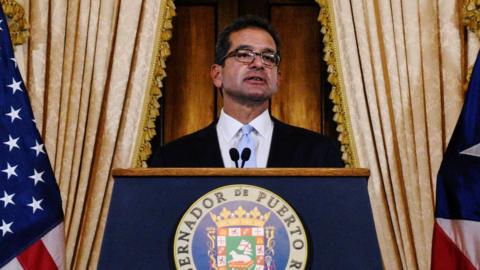 Pedro Pierluisi holds a news conference after being sworn in as governor of Puerto Rico