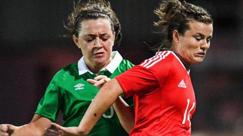 Wales Hayley Ladd under pressure from Irelands Katie McCabe during the Women's B International Friendly Challenge match between Wales and Republic of Ireland at Rodney Parade on August 19, 2016