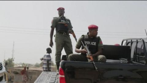 Nigerian police at the scene of the mosque attack in north-east Nigeria, 1 May 2018