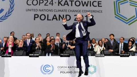 COP24 President Michal Kurtyka celebrates at the end of the COP24 UN Climate Change Conference 2018 in Katowice, Poland