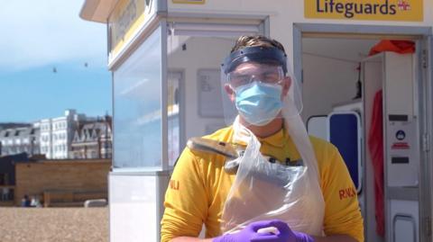 Lifeguard wearing PPE