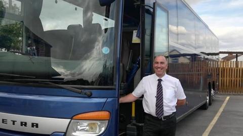 James Clarke, co-owner of Clarkes Travel with his coach