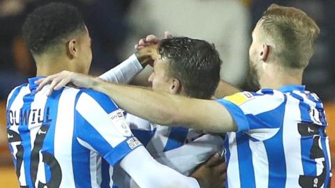 Huddersfield Town players celebrate