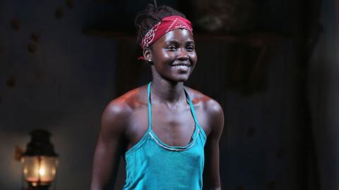 Lupita Nyong'o on stage in Eclipsed