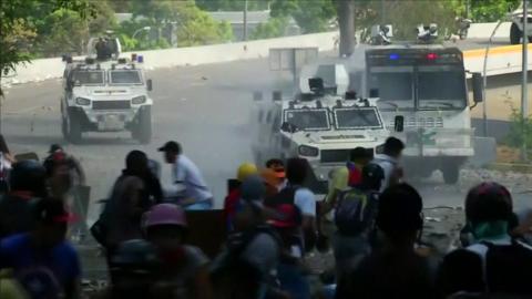 Security forces clash with protesters in Caracas, Venezuela