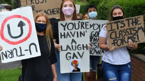 Students marching from Codsall Community School in Staffordshire to the Education Secretary's constituency office to protest against moderated grades