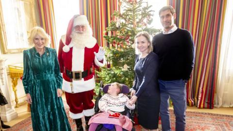 Queen Camilla, Father Christmas, Isla, Morwenna and Mark Naden