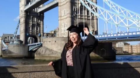 Catrin celebrating graduating from King's College London