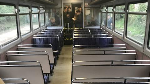 Train with rows of empty seats