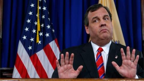New Jersey Governor Chris Christie reacts to a question during a news conference in Trenton, New Jersey.