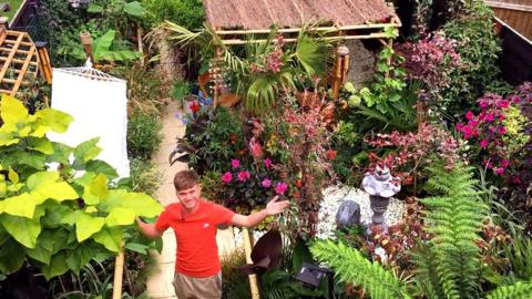 Ross Lee in his tropical-themed garden