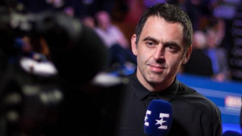 Ronnie O'Sullivan with microphone