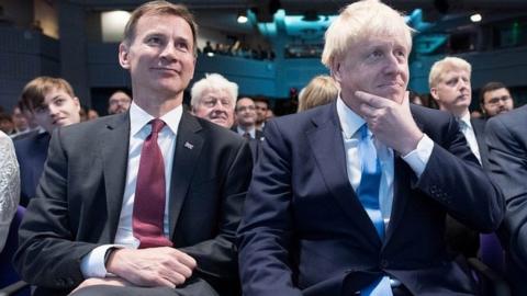 Jeremy Hunt and Boris Johnson after the latter was elected Conservative leader in July