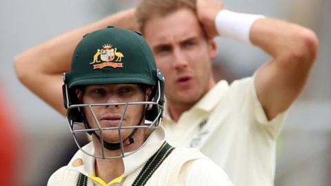 Steve Smith bats as Stuart Broad looks on