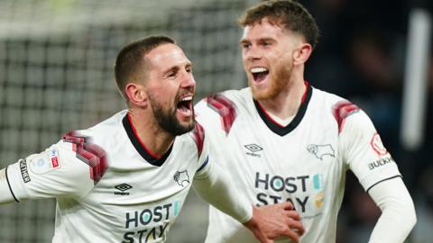 Conor Hourihane (left) celebrates his winning goal for Derby against Burton