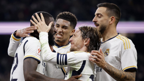 Real Madrid players celebrate a goal