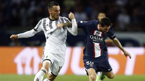 Juventus' Filip Kostic and Paris St-Germain's Lionel Messi