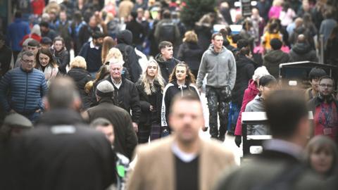 Crowd of people in Glasgow street