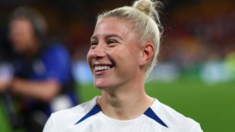 Bethany England celebrates after victory over Nigeria