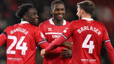 Alex Bangura celebrates with team-mates after scoring Middlesbrough's fourth goal