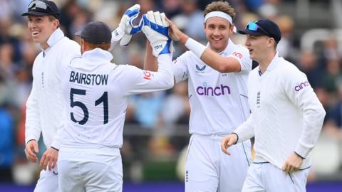 Stuart Broad celebrating a wicket with Jonny Bairstow