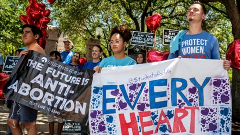 Pro-life protesters stand near the gate of the Texas state capitol at a protest outside the Texas state capitol on 29 May 2021 in Austin, Texas