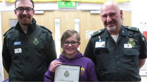 Courtney-Jeanette Jeakins with Call Handler Robert Pitt and Paramedic Simon Wicker