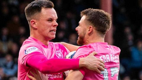 Hearts' Alan Forrest celebrates with Lawrence Shankland as he scores to make it 1-1 during a cinch Premiership match between Dundee and Heart of Midlothian at the Scot Foam Stadium at Dens Park