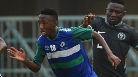 Lesotho's Fothoane Lehlohonolo in action against Nigeria