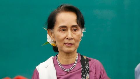 Myanmar's State Counselor Aung San Suu Kyi leaves after speaking during the Myanmar Education Development Implementation Seminar at Myanmar International Convention Center (MICC - 2), in Naypyitaw, Myanmar, 8 December 2017