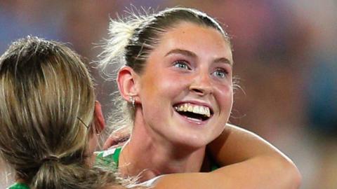 Kate O'Connor celebrates securing a silver medal at the Alexander Stadium on Wednesday