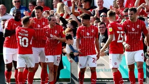 Swindon Town celebrate at Forest Green