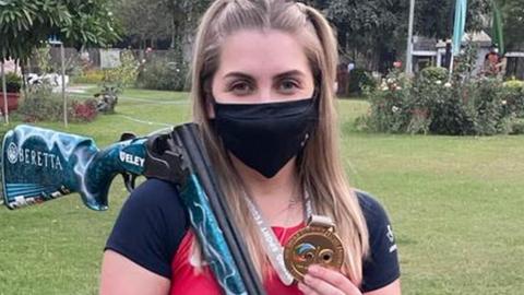 Amber Hill with her skeet World Cup gold medal