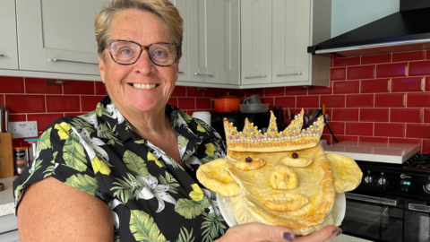 Jackie Marshall with her"royal pie" which was filled with home-grown apple and rhubarb