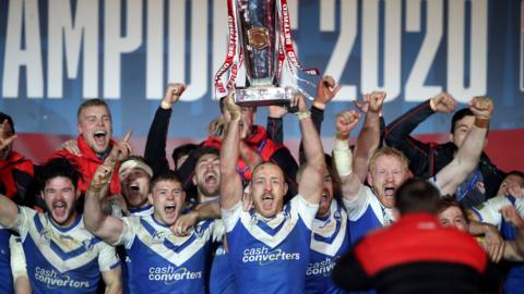 St Helens lift the Super League trophy