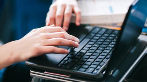 Child using a laptop