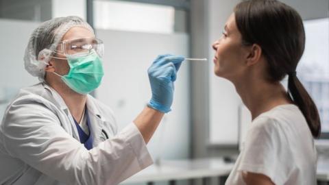 Patient having a PCR test