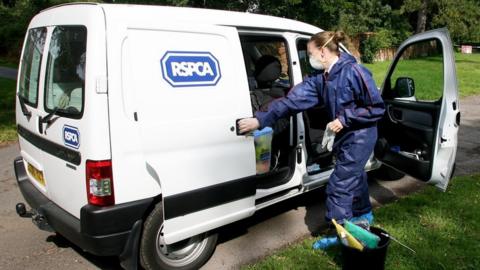 RSPCA officer with van