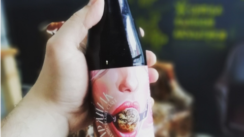 Russian beer bottle with sado-masochistic label, 2018